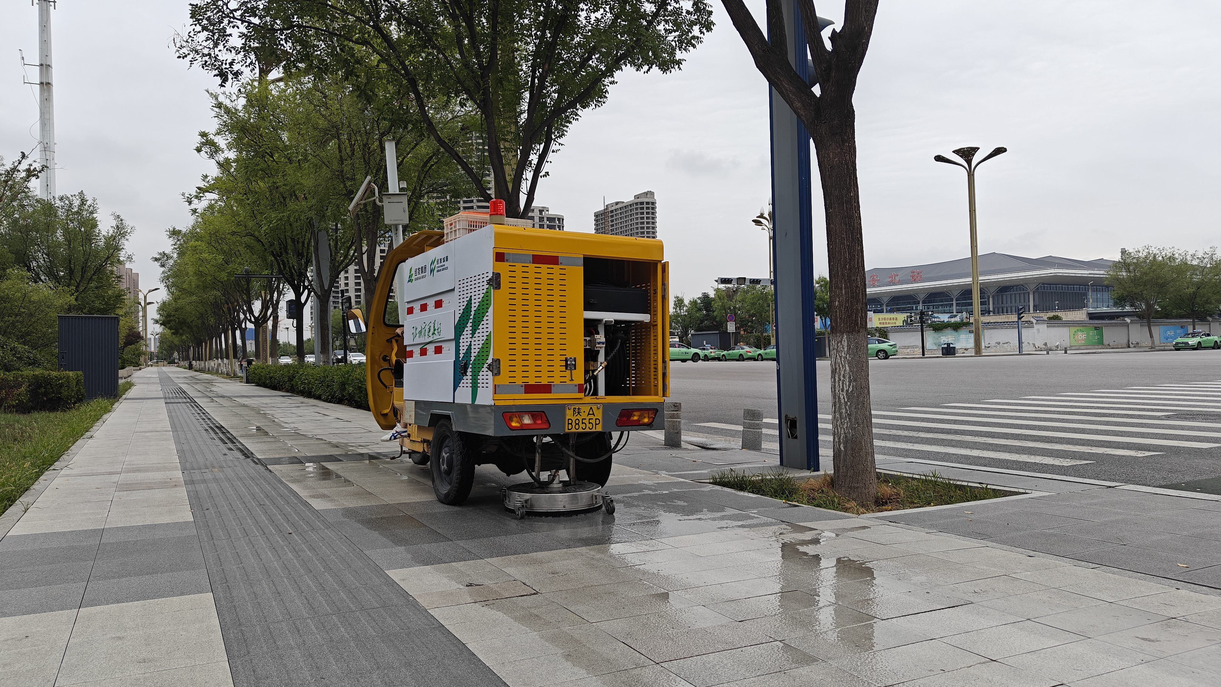 磨盘“坐”上车 环卫添新能